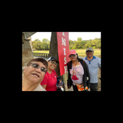 May Dela Cruz partipates in a group selfie at the finish line of her Heart Walk 2021 route.