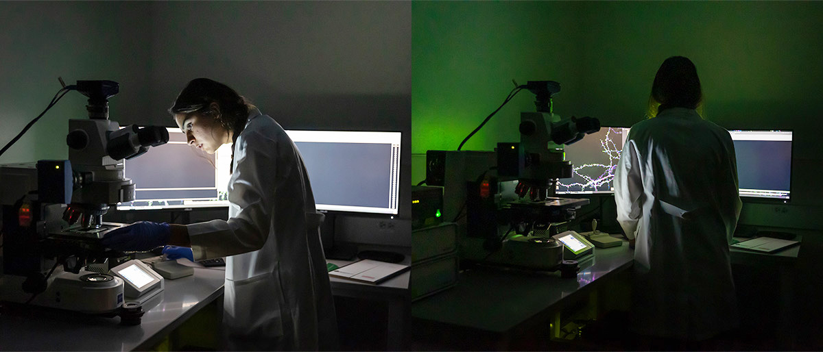 lab technician in green light