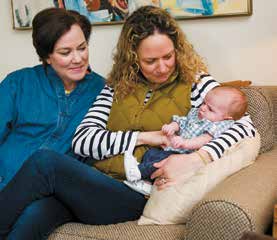 One year to the day after her deep brain stimulation surgery at UT Southwestern, Rogers (left) visits her sister, Kate Hartmann, and niece, Harris.