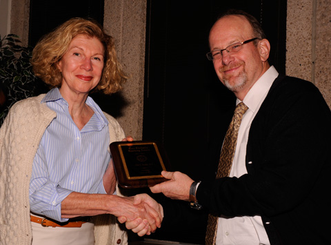 Dr. Greg Fitz, Dean of UT Southwestern Medical School presents award to Ellen Marder, M.D., Associate Professor of Neurology and Neurotherapeutics