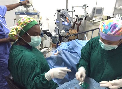 Oluwatosin “Tosin” Smith, M.D., and surgical technician Denise Delrio 480px by 350px