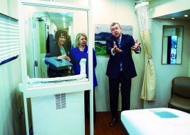 Dr. Keith Argenbright, Director of UT Southwestern’s Moncrief Cancer Institute, provides a tour of the Mobile Cancer Survivor Clinic, which will serve cancer survivors in nine rural North Texas counties.