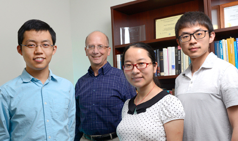 Dr. Daniel Heitjan (second from left) is working on campus with biostatistics doctoral students Gaoxiang Jia, Zhiyun Ge, and Zhengyang Zhou.