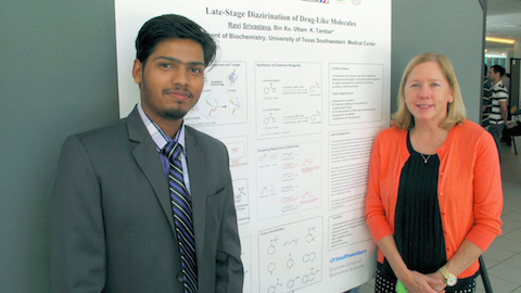Ravi Srivastava, the first student in UT Southwestern’s SURF program to hail from India, explains his poster to Dr. Nancy Street, Associate Dean of the UT Southwestern Graduate School of Biomedical Sciences. 