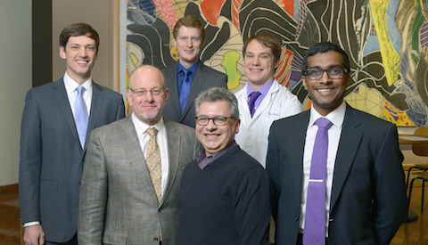 Dr. J. Gregory Fitz and Dr. Rene Galindo (foreground, left and right) complimented the oral presenters – (background, from left) Stephen Spurgin, Adam Combiths, Austin Moore, and Puneet Kumar – at the 54th Annual Medical Student Research Forum.