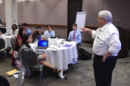 Dr. Gary Reed leads a discussion at the Quality Improvement Boot Camp, an event designed to teach students skills to improve processes and reduce errors that impact patient care.