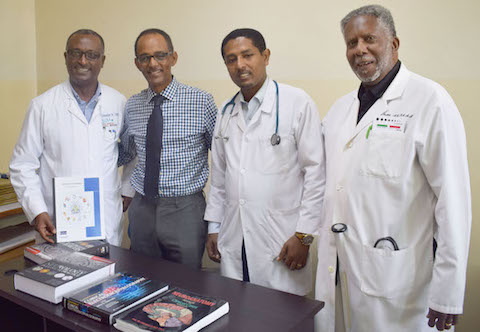 Dr. Mehari Gebreyohanns and a group of doctors
