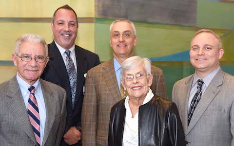 Dr. Patricia Capra, who founded the Capra Interdisciplinary Healthcare Symposium with her late husband, Dr. J. Donald Capra, is joined by (from left) former School of Health Professions Dean Dr. Raul Caetano, Dr. Jon Williamson, her son Dr. Jay Capra, and Dr. Scott Smith at the 2017 event.