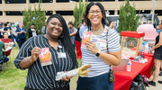Deandra Turner (left) and Ashley Haider (right) pose with their tasty food.