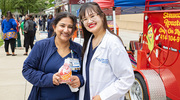Farzana Madhani (left) and Sandy Diep (right) enjoy an afternoon of celebration.