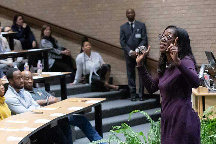 A woman speaking at the Dr. Martin Luther King Jr event at UTSW