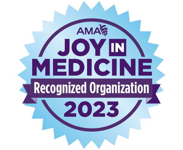 round starburst logo - Joy in Medicine 2023 honor from NAM