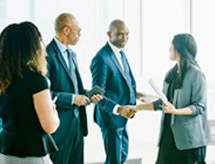 Group of people shaking hands