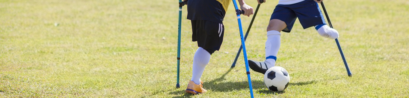 Two kids playing soccer