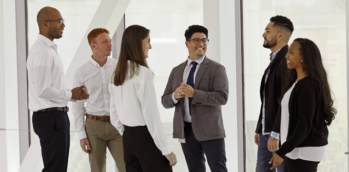 A group of professionals having a conversation