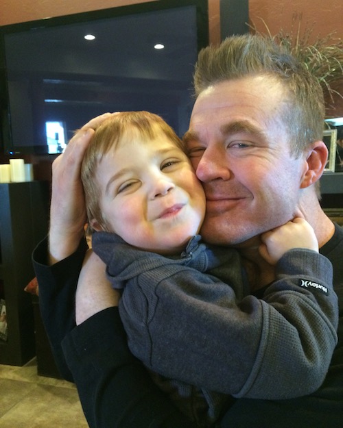 Matthew Hann embraces his son Joseph.