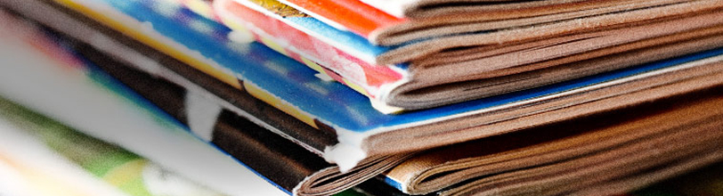 Stack of magazines illustrating UTSW printed publications