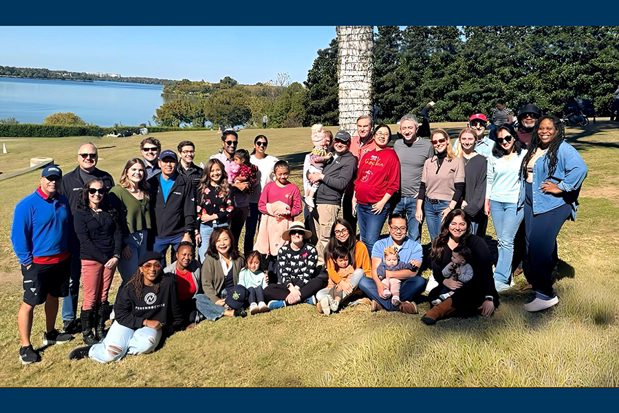 Group of people in grassy area