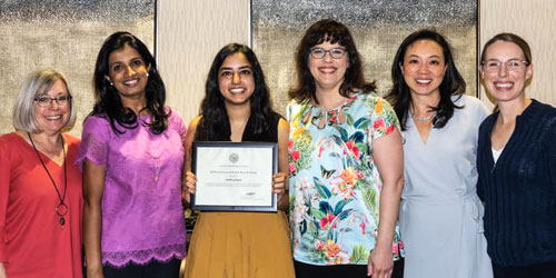 Dr. Anisha Ganguly with faculty mentors after receiving the U.S. Public Health Service 2019 Excellence in Public Health Award.