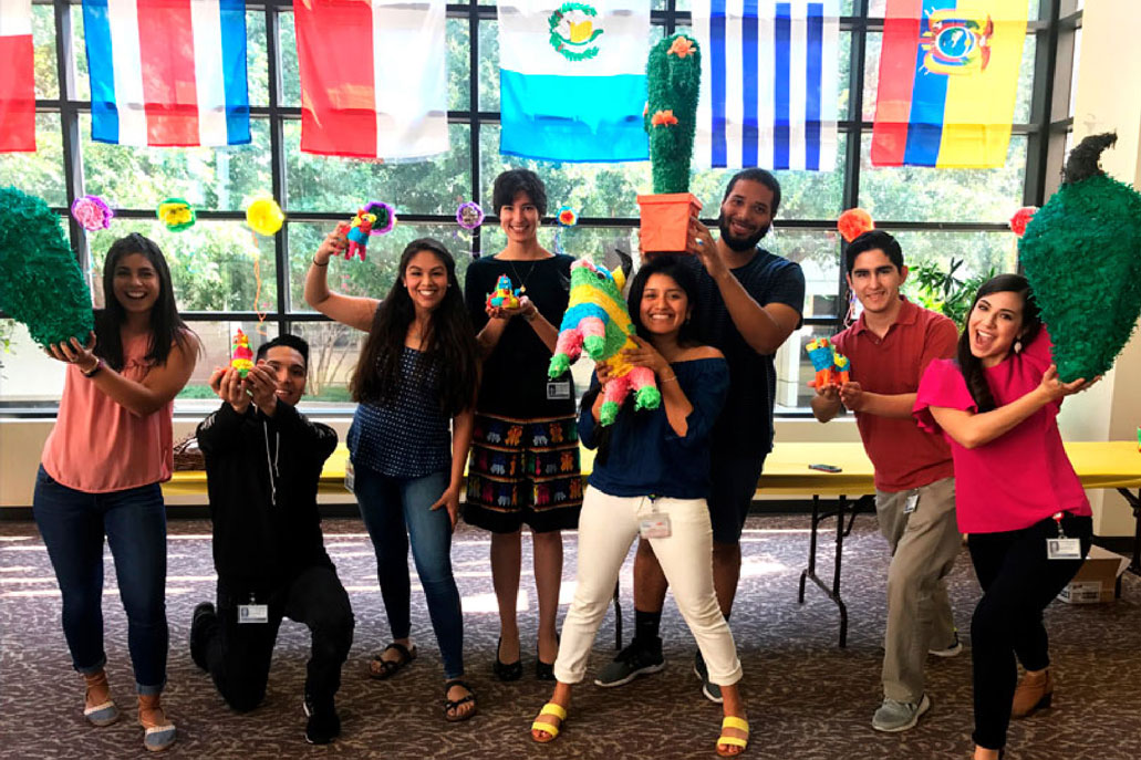 Students pinatas, dolls, and other large symbols of the Hispanic heritage