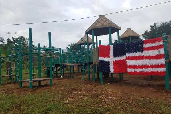 Playground promotes Dominican Republic and U.S. flags