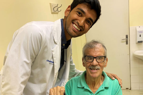 Sumanth Reddy and a patient at the Hospital de Clinicas de Porto Alegre