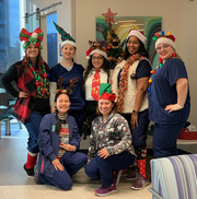 Front row (left to right): Grace Aguila-Graham and Debbie Bauman; Back row (left to right): Kelsey Gallegos, Victoria White, Jessica Govea, Yaneishia Johnson and Tamara Andino – Simmons Cancer Center
