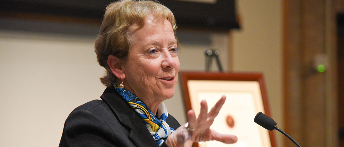 Dr. Julie A. Freischlag speaking at lectern