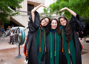Dr. Laura Yuan (left), who recently received recognition for her demonstrated excellence in psychiatry, gets an Instagram-worthy photo with her friends and fellow newly minted M.D.s.