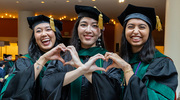 From left, graduates Michelle Nguyen, M.D., Leilani Conklin, M.D., and Varsha Mullangi, M.D., put their hearts into a photo memory.