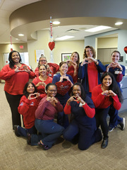 "Excellent care begins at the front desk," say staff at the Simmons Cancer Center Richardson. Front row, from left: Lashaquay Allen and Cynthia Gilbert; Second row, from left: Prabha Batra, Tessie Thomas, Aurora Relampagos, and Shilpa Matthew; third row, from left: DeAnna Bennett, Kristina Knapp, Silvia Herszkopf Oreamuno, Lisa Pedersen, and Emily Davidson