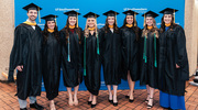 Master of Physician Assistant Studies graduates gather for a celebratory commencement photo.
