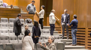 During a break in the forum, audience members network and mingle to share ideas and further efforts for collaborative research.