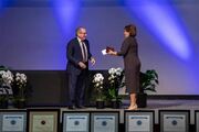 Dr. Diane Twickler receives the 2021 Watson Award from UTSW President Dr. Daniel K. Podolsky.