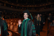 Medical School student in auditorium following commencement