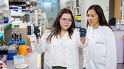 Neuroscience Program graduate student Carla Rivera-Pacheco, left, and Helen Lai, Ph.D., Associate Professor of Neuroscience and Anesthesiology & Pain Management, conducted an experiment in Dr. Lai’s lab.