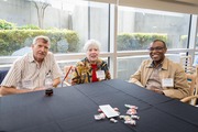 UTSW volunteers Mr. Myers, Mrs. Myers, and Vernon Gewa. Mr. Gewa volunteers at the UT Southwestern Monty and Tex Moncrief Medical Center at Fort Worth.