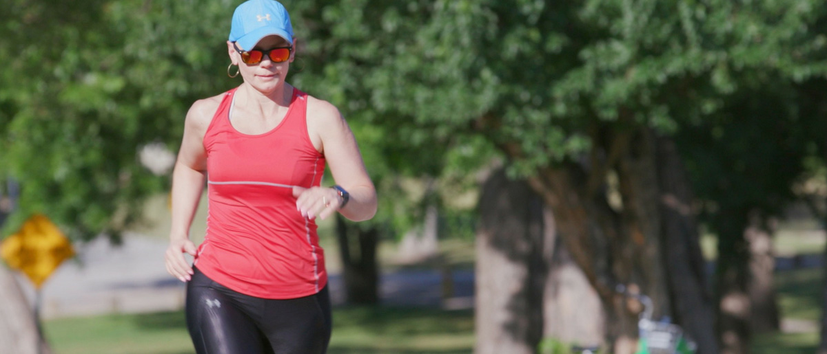 Breast cancer patient Amie Goins kept up her running during treatment, completing eleven 5Ks and even winning one race in her age category