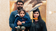 Master of Science in Health Informatics graduate Prabu Lakshmanan commemorates the occasion with a family photo.