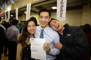 Gene Hu, matched in Internal Medicine at UC San Francisco, celebrates with his fiancé, Stephanie Guo, and friend Loktao Shing.
