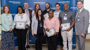 Executive Vice President for Business Affairs Holly Crawford, Vice President and Chief Human Resources Officer Jeremy Falke, and others are pictured with Gold pin recipients representing Business Affairs.