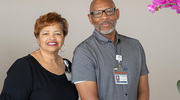 HR Talent Acquisition colleagues Reggie Helms and Regenia Williams pose for a photo.
