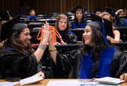 For Drs. Kathryn O’Donnell (left) and Shurthy Suresh Aggarwal, the day deserves a high five.