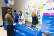 Staff from the Office of Communications, Marketing, and Public Affairs (from left) Charlondra Thomas, E.E. Anderson, and Dorothea Bonds assist an event attendee.