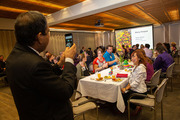 Guests relaxed at dinner with colleagues and friends.