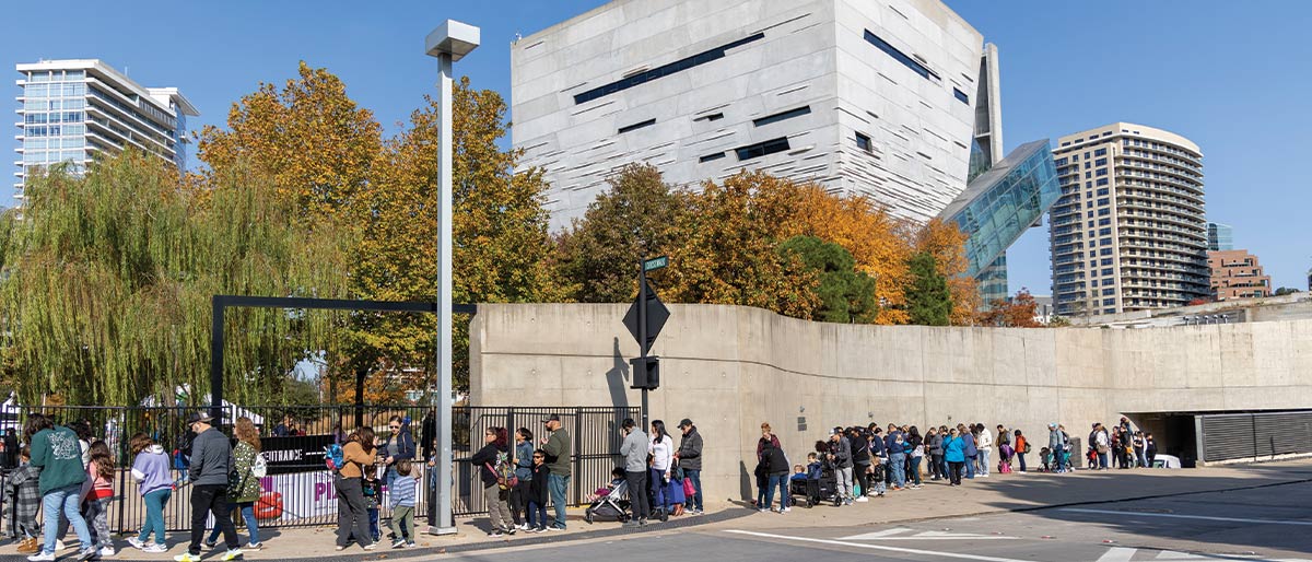 people standing outside the Perot building