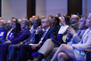 The audience watches a moving video featuring one of the award recipients.