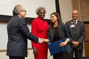 Priya Mathew receives the MLK Scholarship award from Dr. Podolsky.