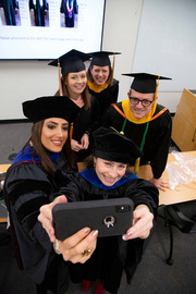 Assistant Professor Dr. Hoda Yeganehjoo (front left) and Associate Professor Dr. Lona Sandon (front center) take a group selfie with fellow School of Health Professions Instructors (back row, left to right) Alicia Gilmore, Kathleen Eustace, and Tad Campbell.