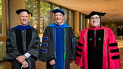 Platform Party members include (from left): keynote speaker David Russell, Ph.D., Professor Emeritus of Molecular Genetics; Graduate School Dean Andrew Zinn, M.D., Ph.D.; and President Daniel K. Podolsky, M.D.